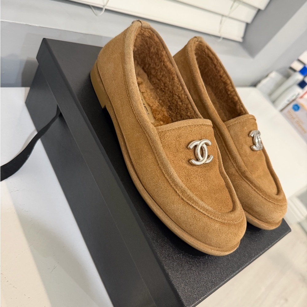 CHANEL Tan Suede Loafers with Silver Logo